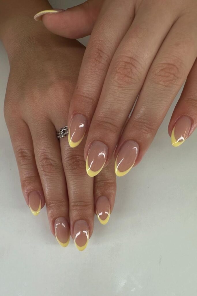 Pastel Yellow French Tips Nails