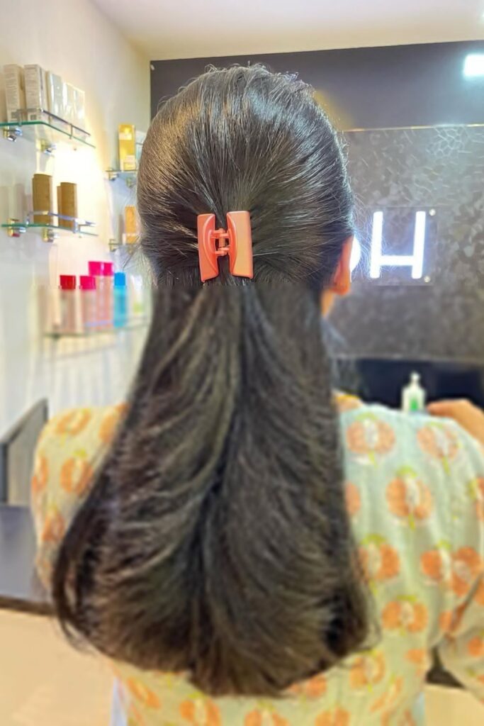 Center-Parted Sleek Hair