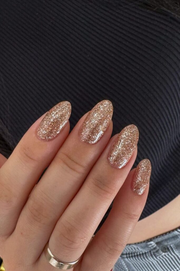 Gold Sparkle Almond Nails