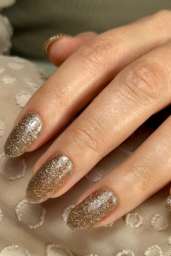 Nude and Gold Sparkle Nails
